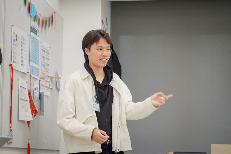 Agent College teaching at a school career day in Hong Kong